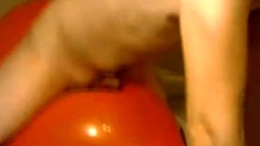 Twink Humping and Cumming on an Inflatable Orange Balloon