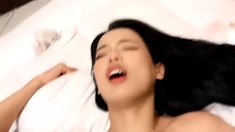 Amateur Asian teen sucks a big cock