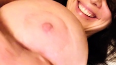 Big tit MILF does close up while dildoing her pussy