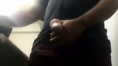Brazilian Daddy Strokes His Big Uncut Cock at Work