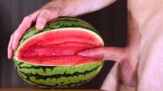 Muscular Stud Fucks And Cums On Watermelon
