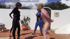 BALLBUSTED BY THREE DOMMES