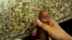 Dare to JO in a public restroom