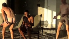 Four men at swimming pool